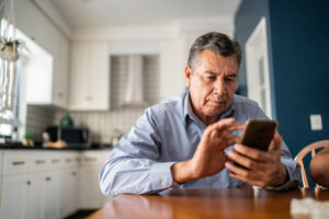 Man looking at cell phone